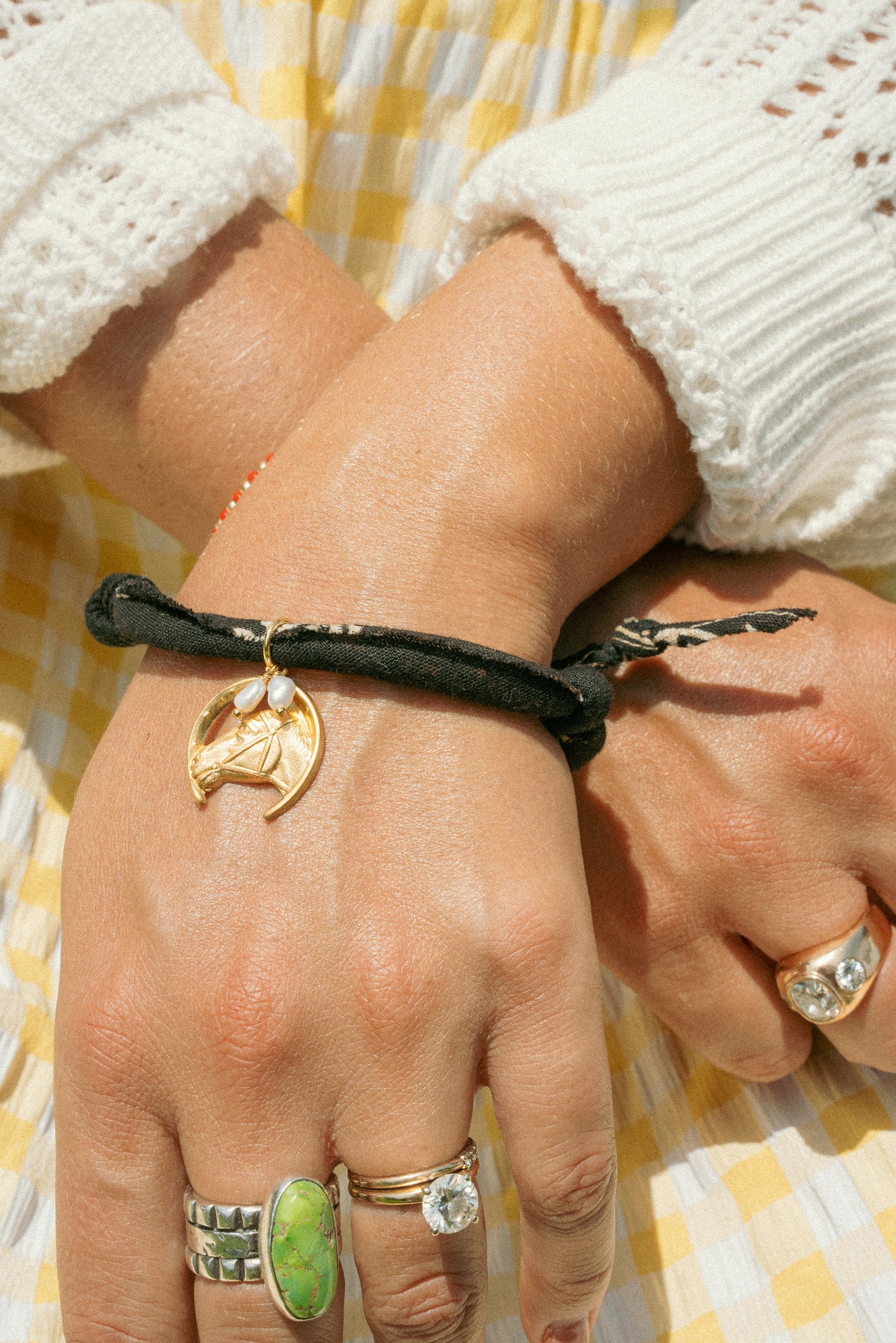 Black bracelet + vintage horse w/ pearls