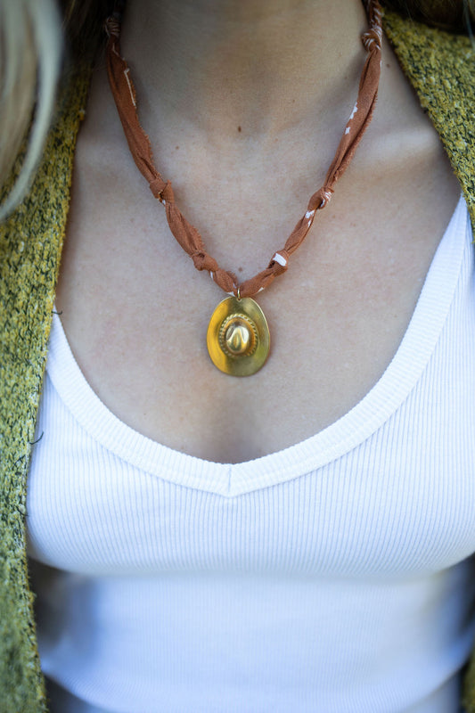 Vintage cowboy hat + brown