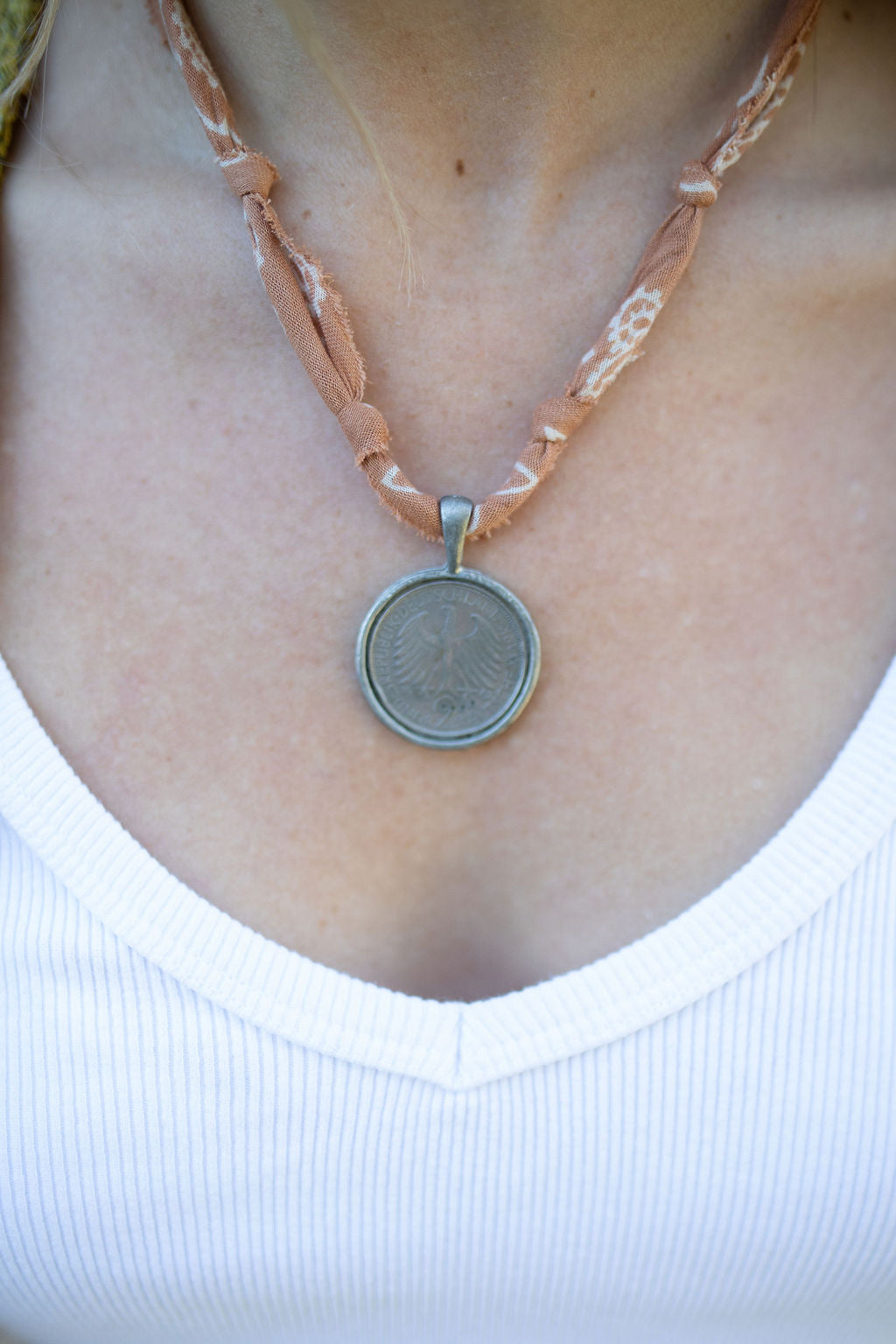 Vintage silver coin + brown