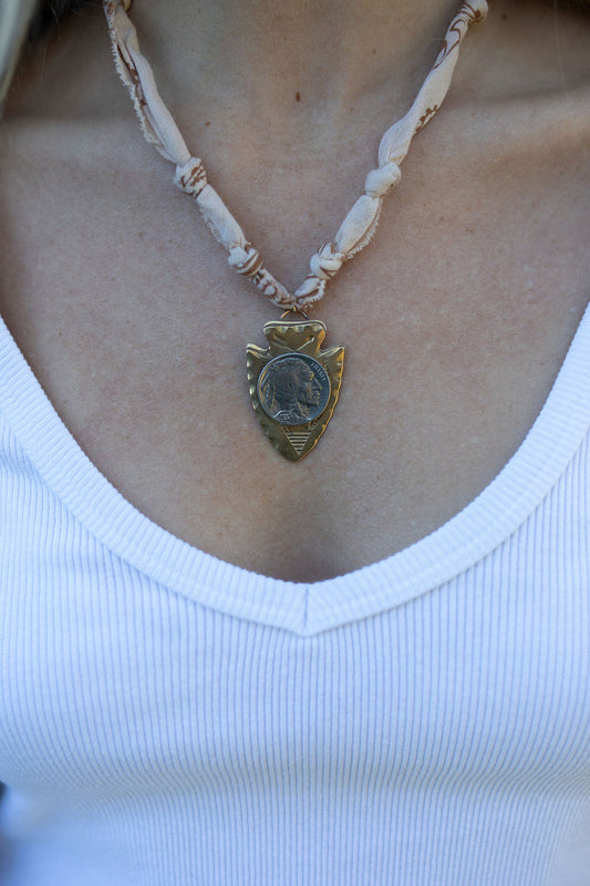 Vintage arrowhead + tan