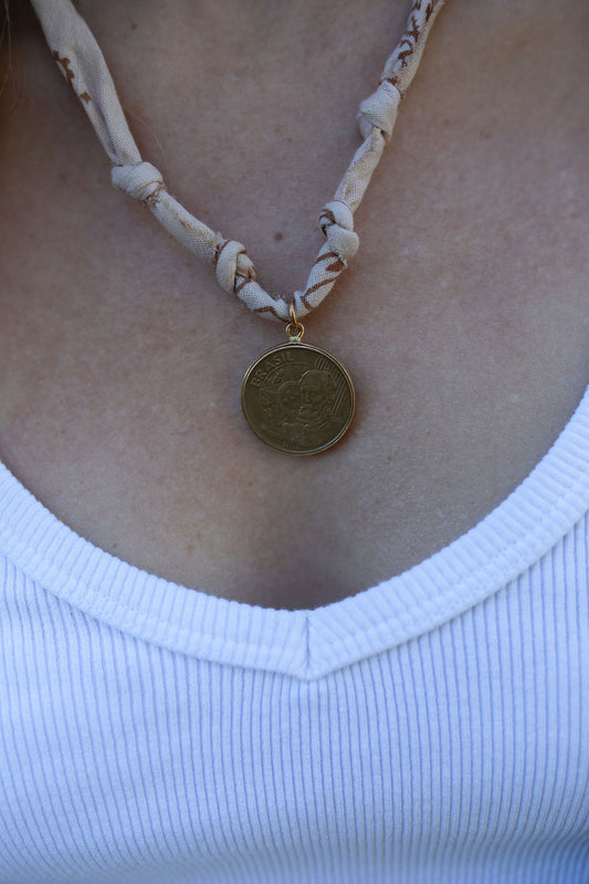 Vintage coin + tan