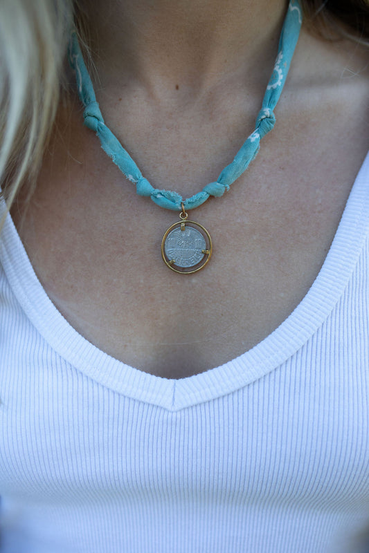 Two toned vintage coin + faded teal/blue