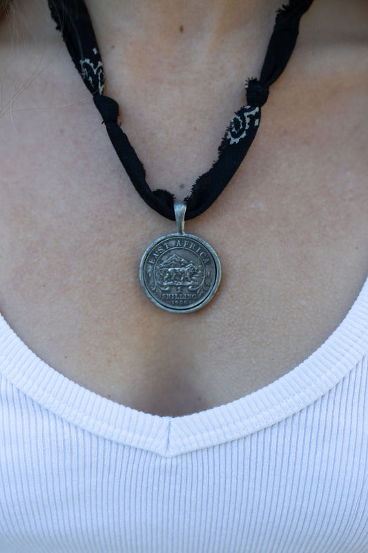 Vintage silver coin + black