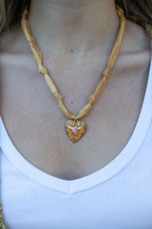 Vintage painted heart + faded yellow