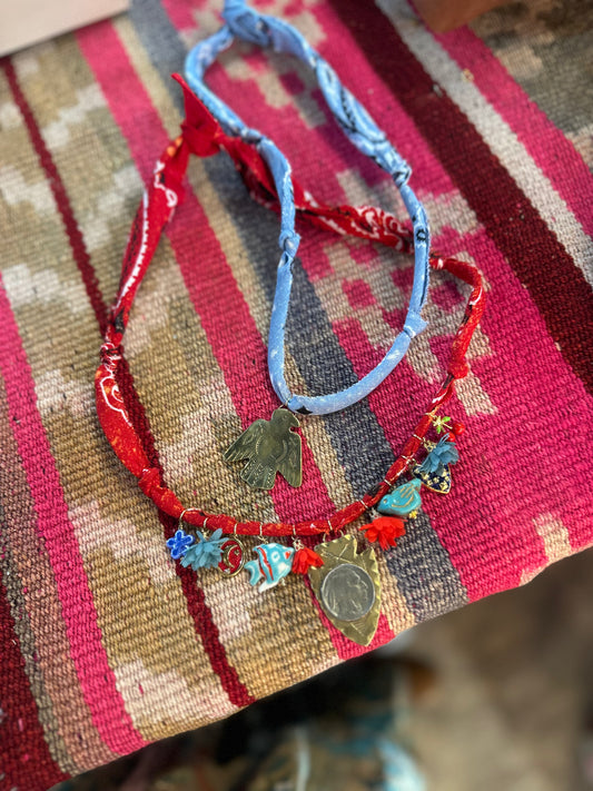 Red arrowhead + blue thunderbird