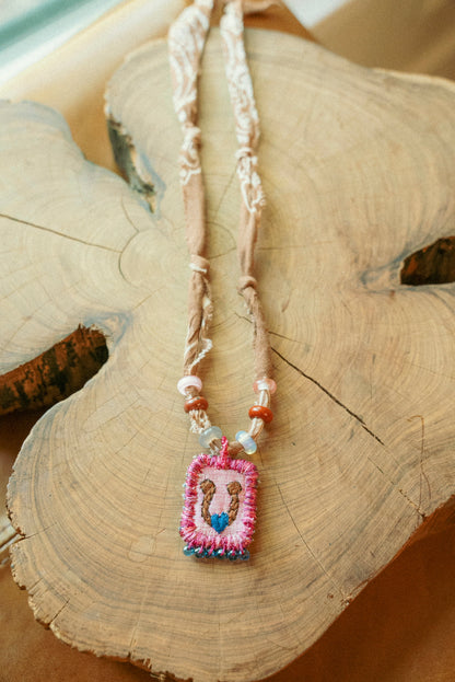 Beaded handmade Italian horseshoe pendant + brown