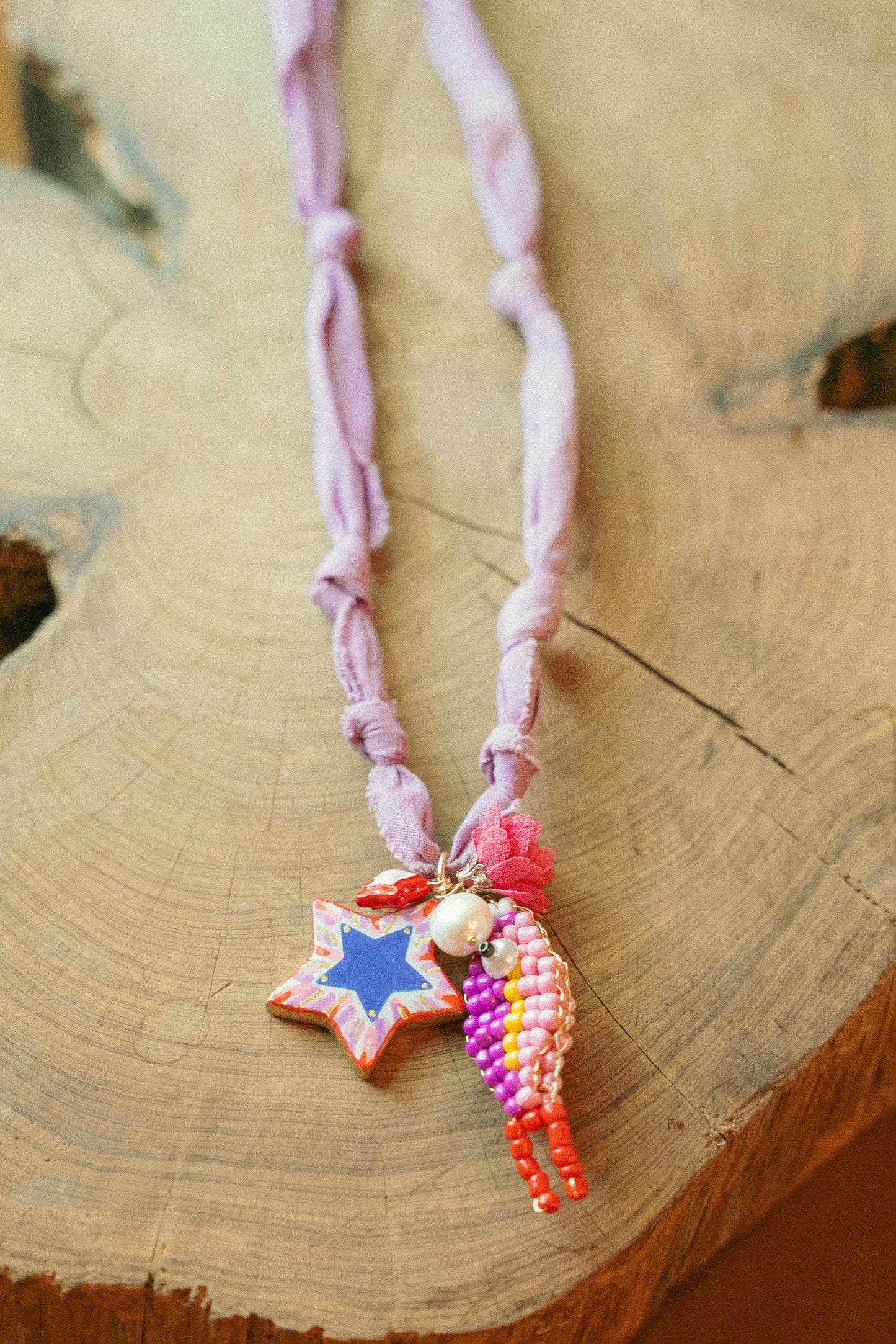 Hand painted star and beaded fish + purple