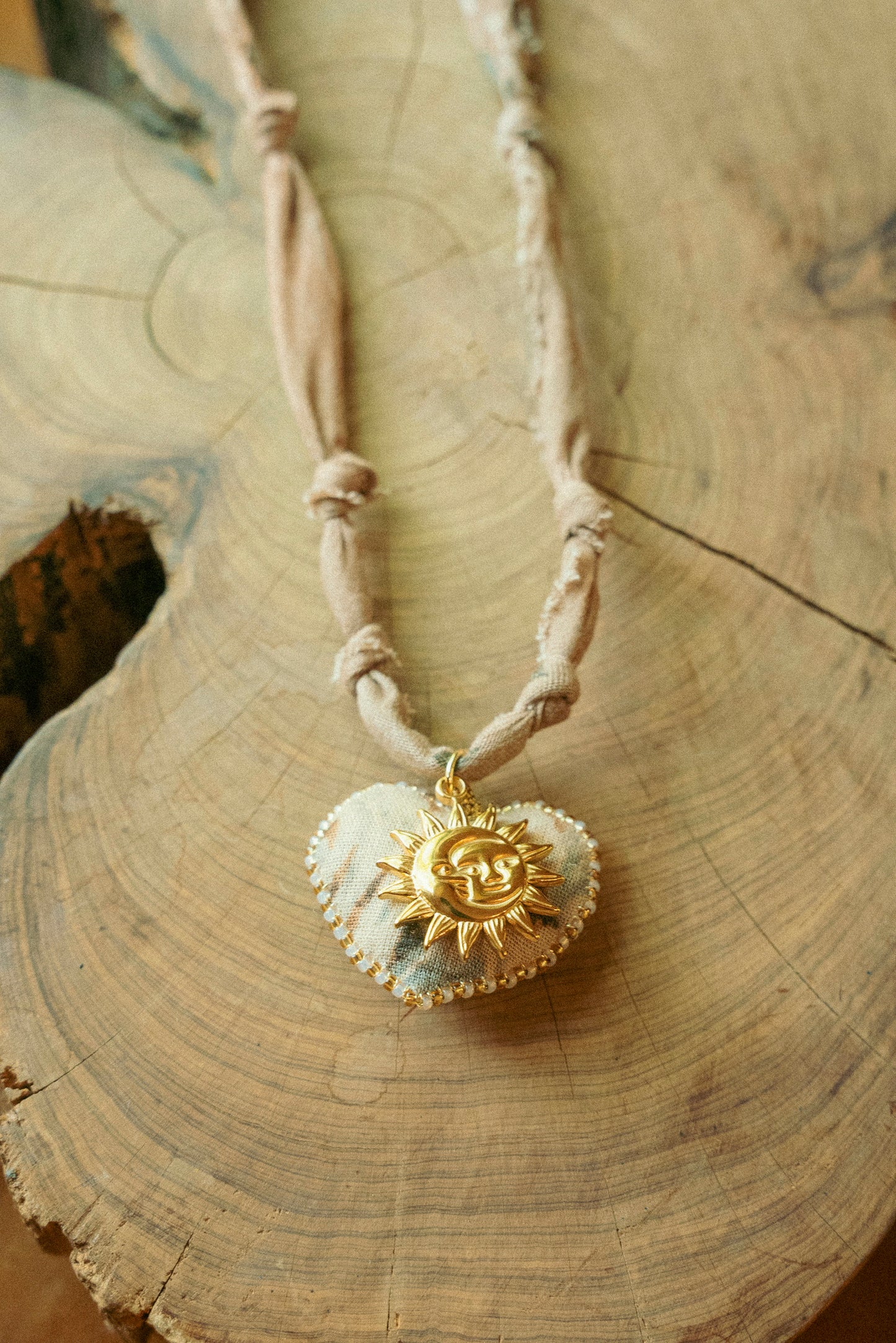 Hand beaded bandana heart (from Paris) layered with European sun