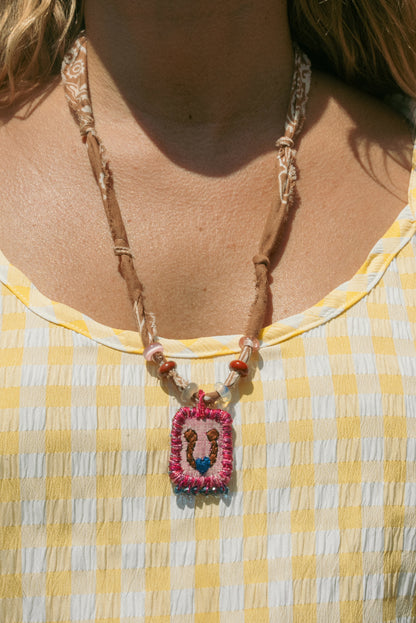 Beaded handmade Italian horseshoe pendant + brown