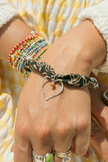 Sterling spiny oyster stone heart + black bracelet