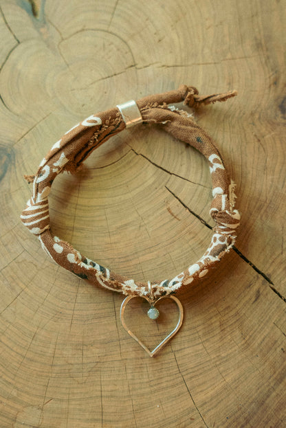 Handmade sterling silver w/ mother of pearl stone + brown bracelet