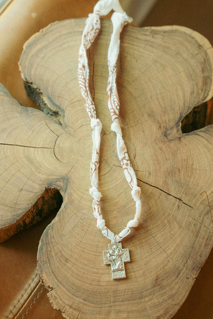 Silver cross + white