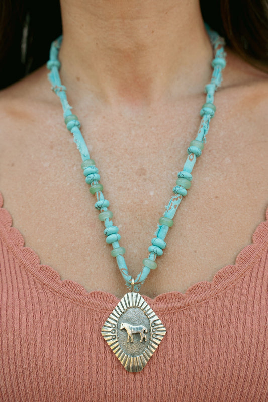 Beaded sterling horse pendant